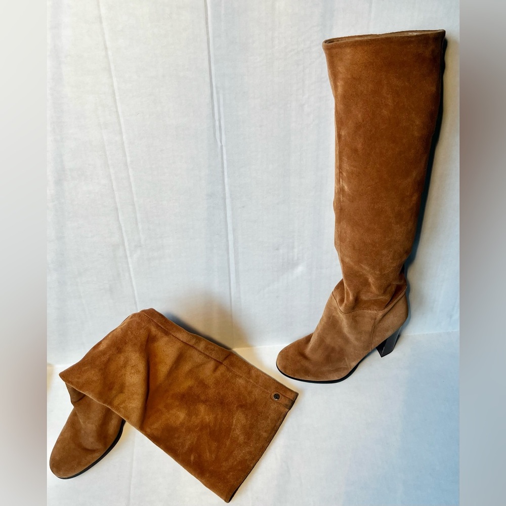 Brown faux leather thigh high boots. Size 8 women’s.